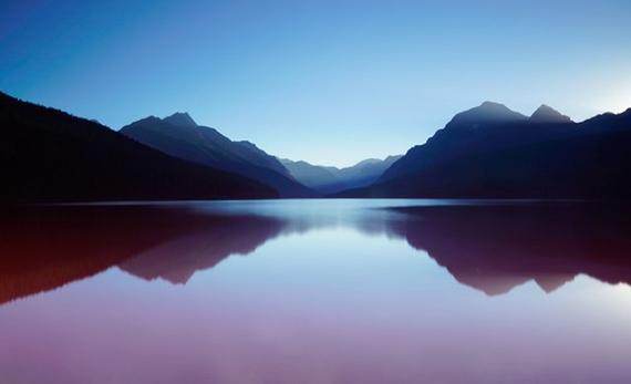 Spiritual poetry with Barbara Payman. Reflections blog image of reflective lake and mountains.